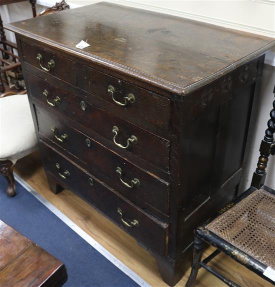 An early 18th century oak chest of drawers, W.97cm